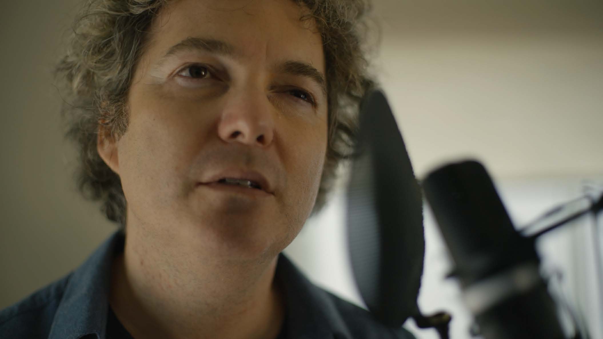 Justin in the voice over booth